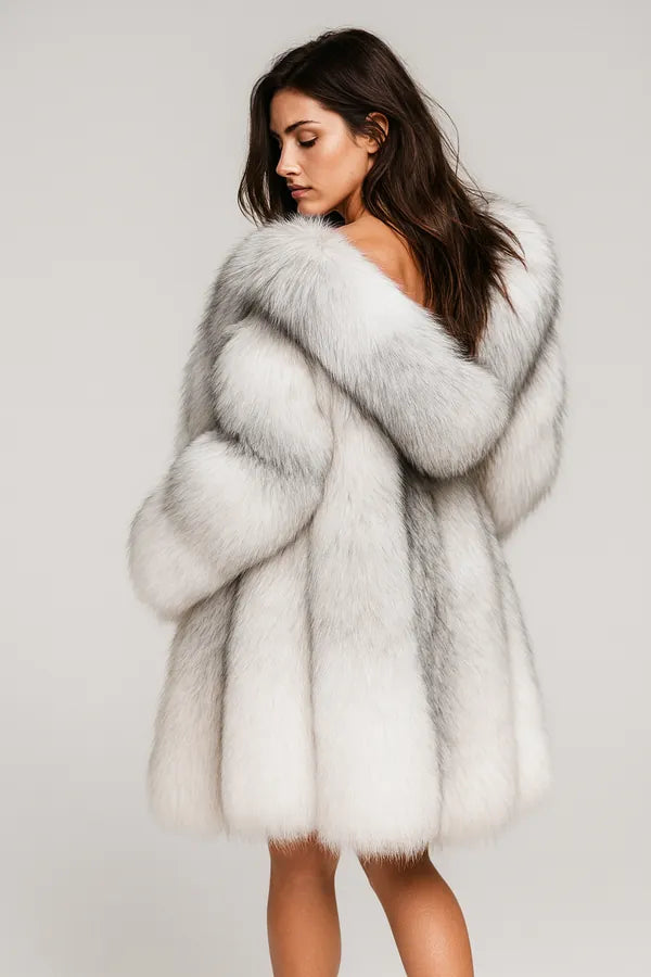 Back view of women's luxury white faux fur coat - glamorous winter fashion